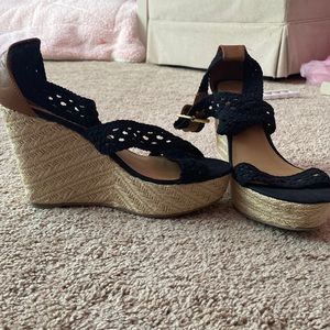Tan and black strap wedges